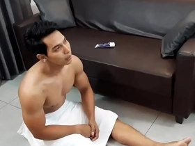 Asian hunk gets off to watching his gym coach.