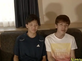 Japanese twink gets a facial in this gay porn video.