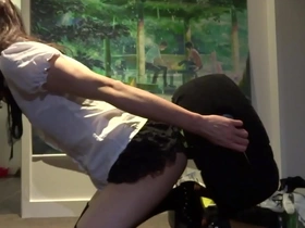 Crossdresser enjoys anal pleasure with toys