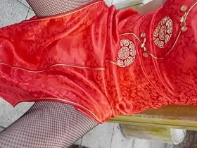 Japanese crossdresser in qipao stockings, solo boy BDSM scene.