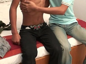 Asian twinks indulge in passionate foreplay