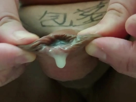 Japanese man masturbates with uncut cock and shaved pussy