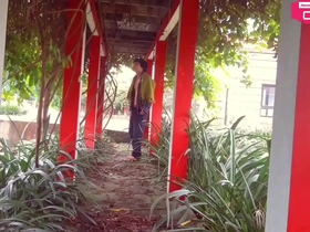 Horny Indonesian teen strips down in a China Town garden