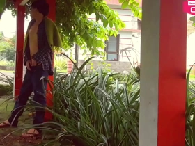 Young and horny solo boy explores China Town garden in the nude