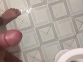 Asian boy indulges in solo play, inviting viewers to watch