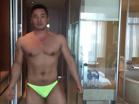 Tony, the Asian male model, showing off his body and wanking.